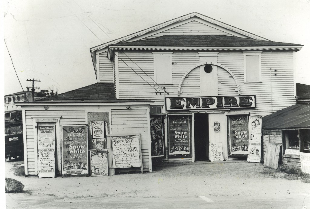 One of the few American industries that expanded in the Depression was the film industry that produced movies that helped Americans dream. This shot shows the Empire Theatre advertising Snow White, one of Disney’s contributions to animated film history.